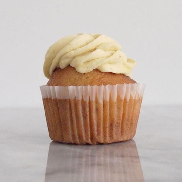 Order Banana Cupcake with Banana Buttercream food online from Baked Cravings store, New York on bringmethat.com