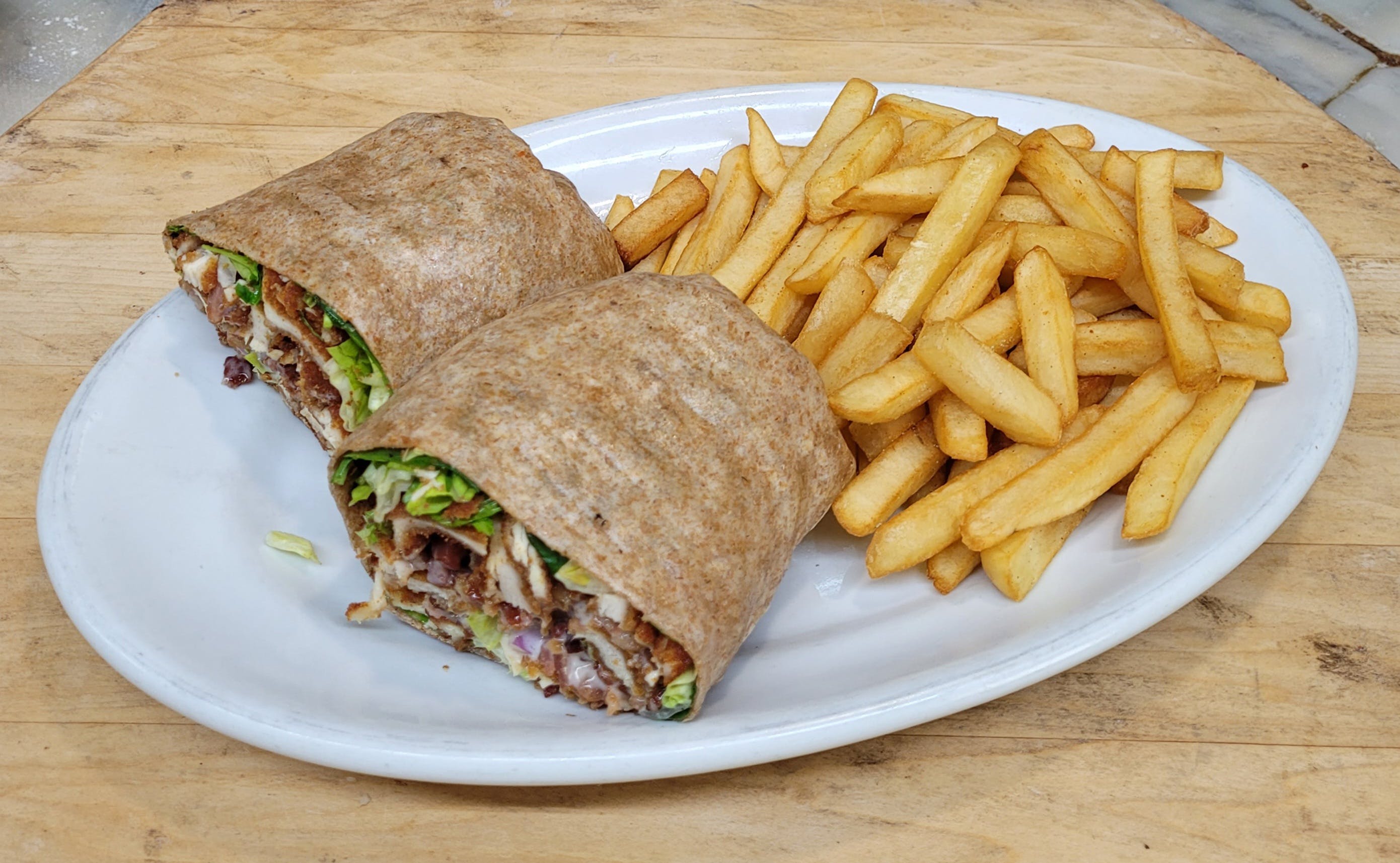 Order Chicken Cutlet Wrap - Wraps food online from Rhythm And Spice Pizzeria And Grill store, New Brunswick on bringmethat.com
