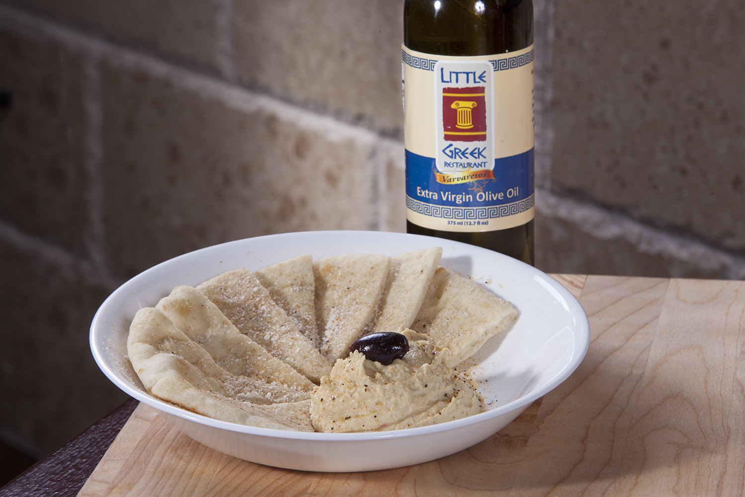 Order Hummus with Pita Bread food online from Little Greek Fresh Grill store, Louisville on bringmethat.com