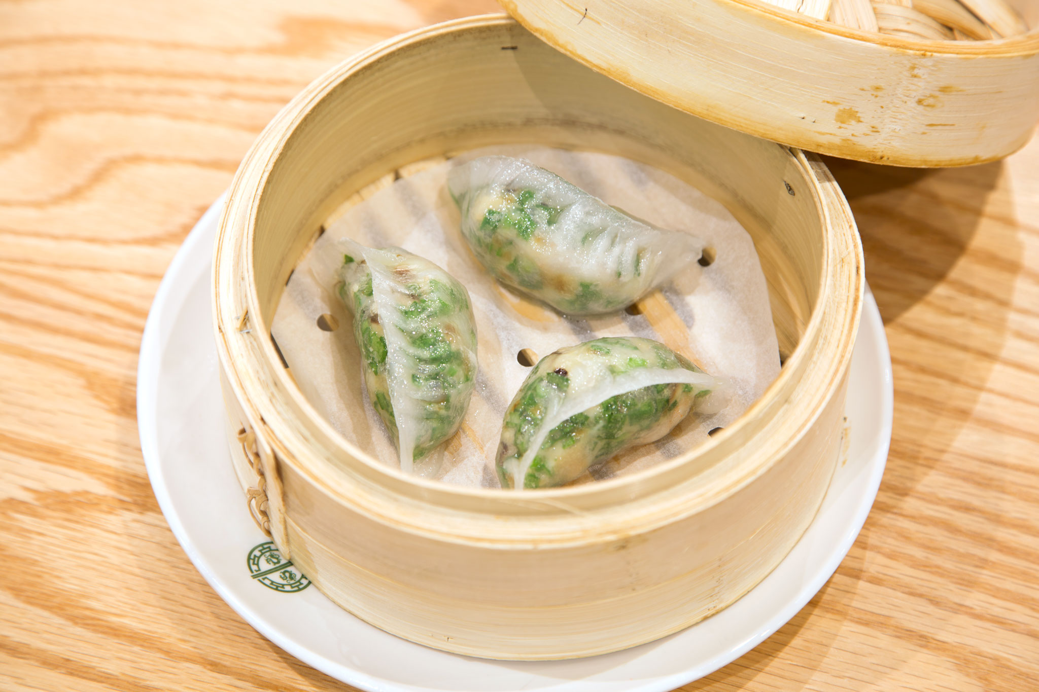 Order S2. Steamed Dumplings with Shrimp and Chives food online from Timhowan store, New York on bringmethat.com