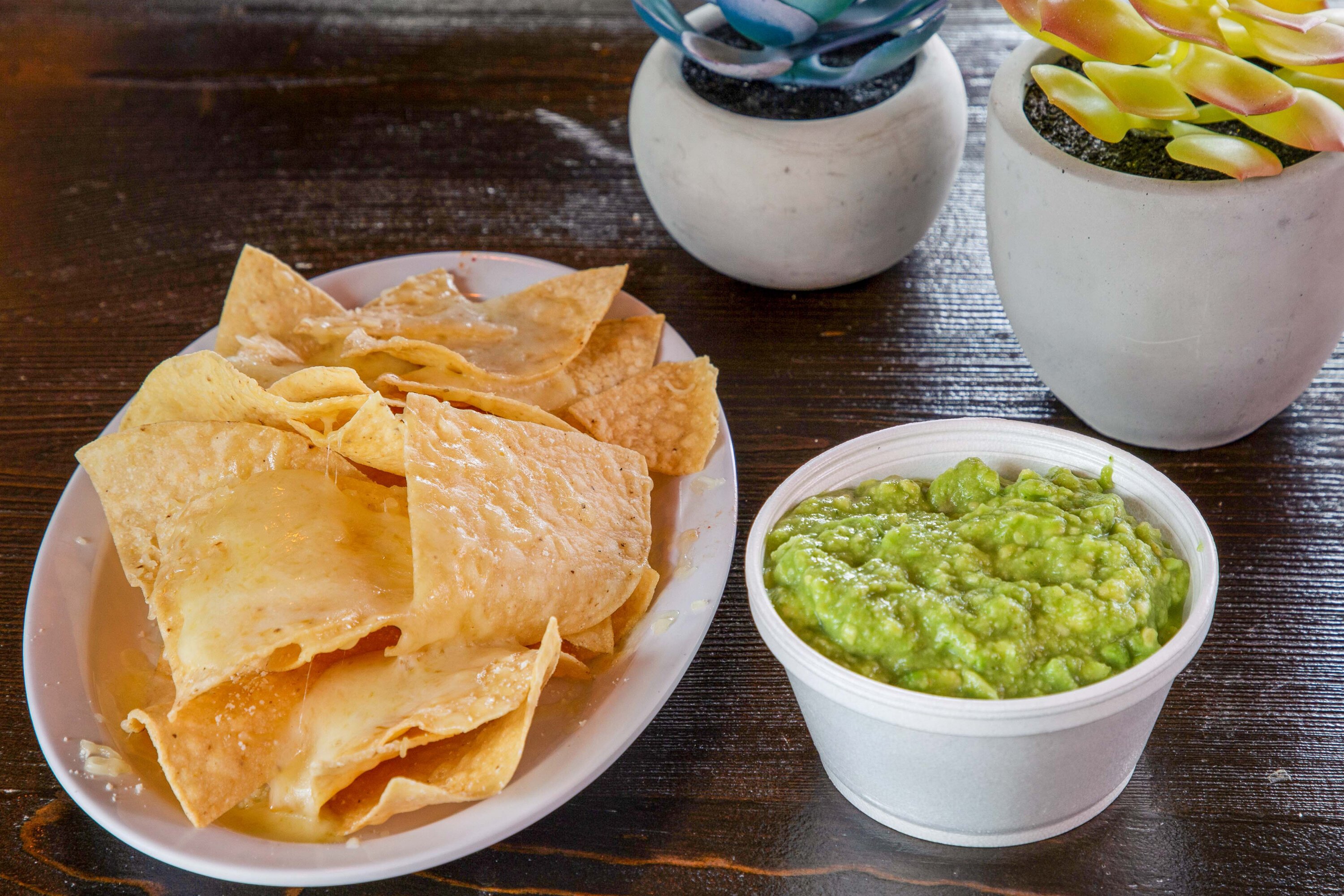 Order CHIPS W GUAC ＆ CHEESE* food online from Señor Taco store, Scottsdale on bringmethat.com