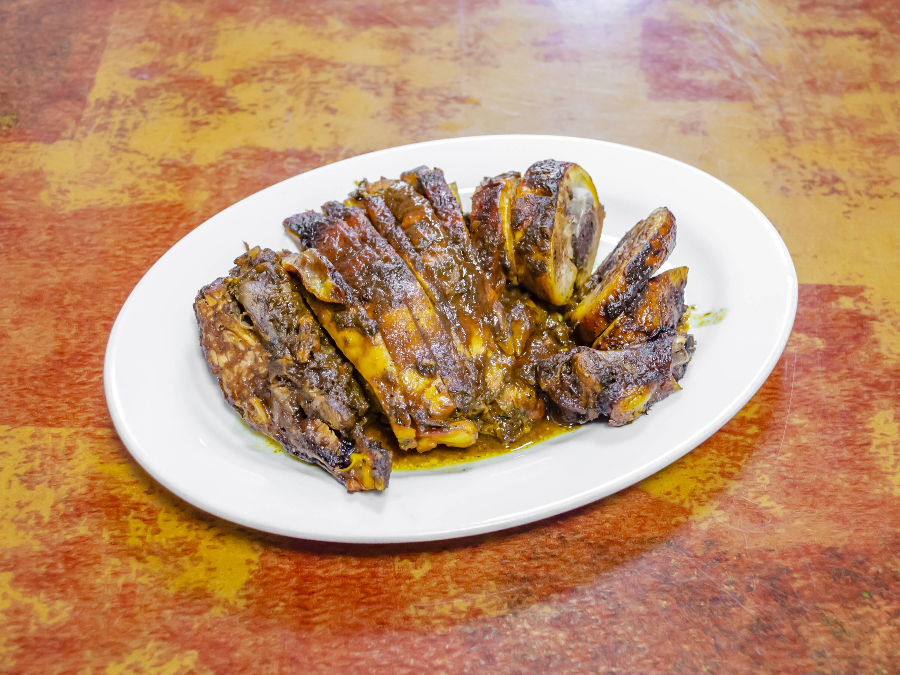 Order Jerk Chicken food online from Coconut Palm Bar & Grill store, Bronx on bringmethat.com