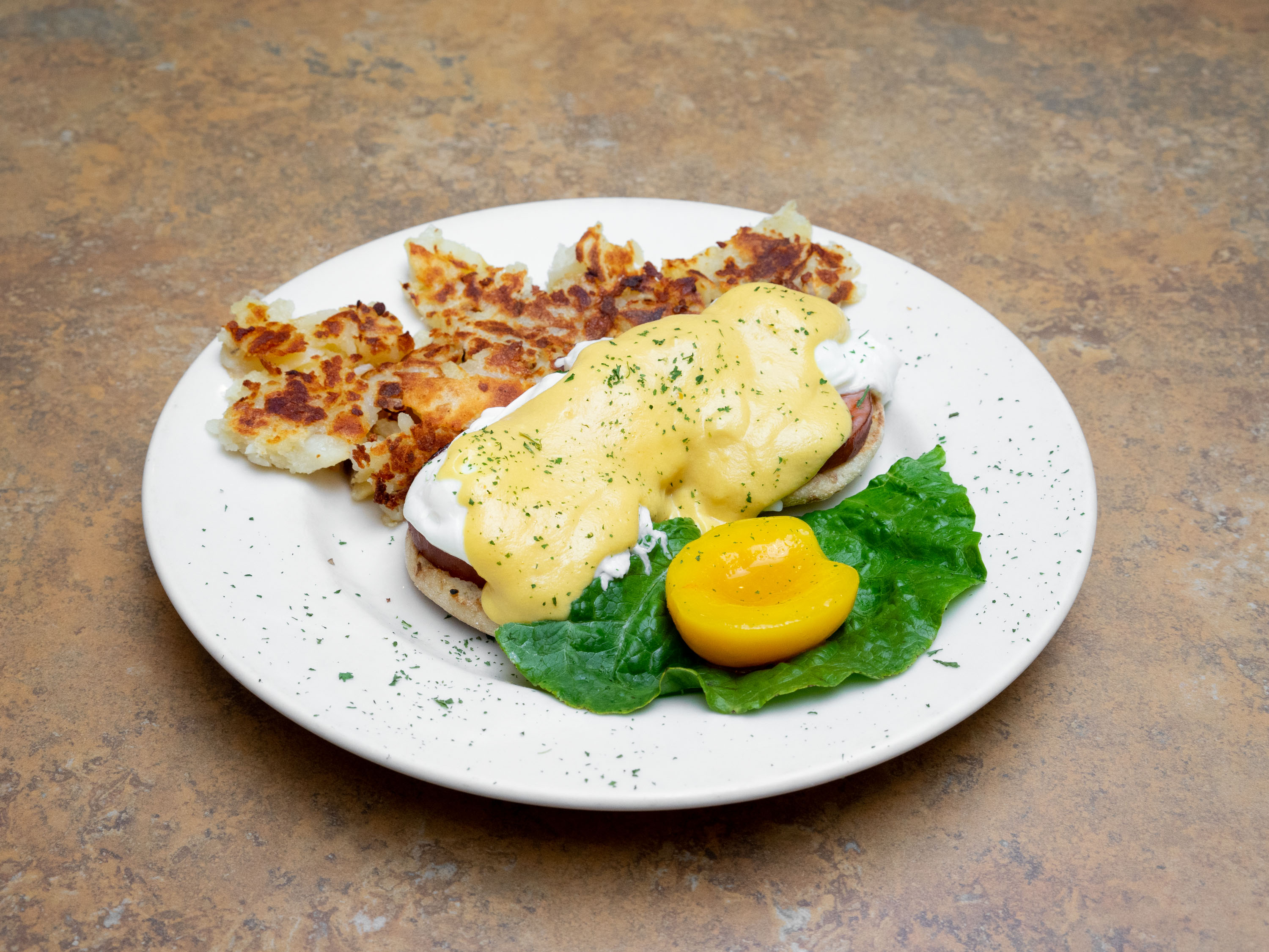 Order Eggs Benedict food online from Les Cafe Pancake House store, Highland on bringmethat.com