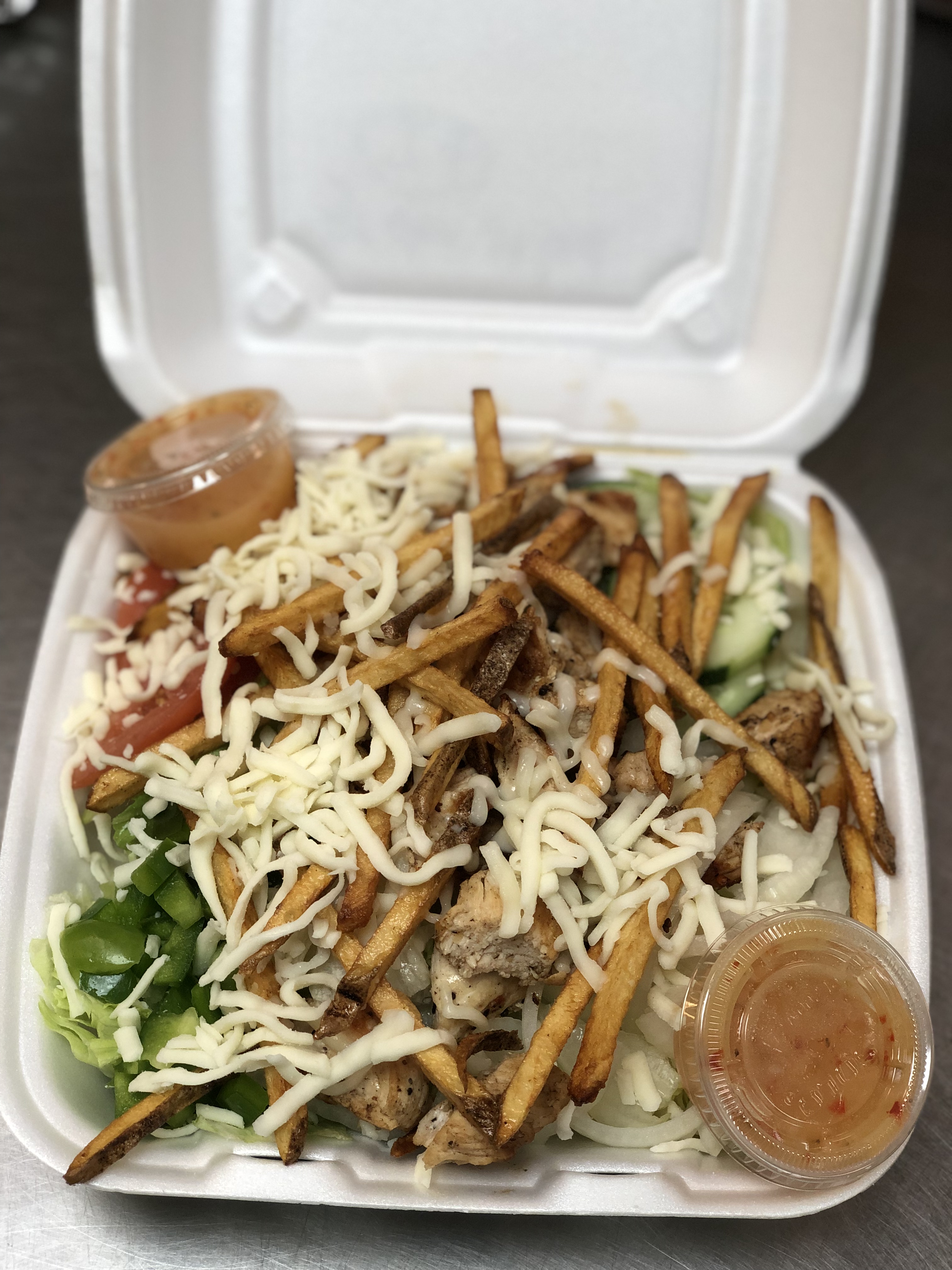 Order Grilled Chicken Salad Tossed in Sauce food online from Route 51 Wings store, Brentwood on bringmethat.com