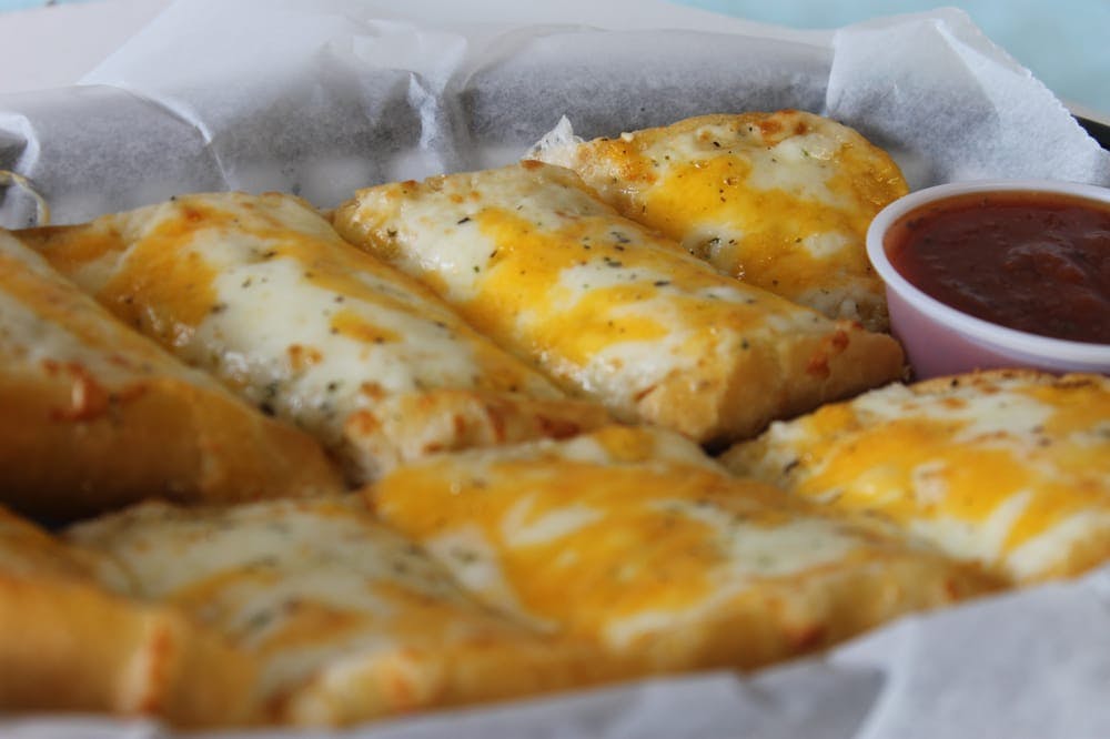 Order Garlic Bread with Cheese - Appetizer food online from Luna Pizza Kitchen store, Dublin on bringmethat.com