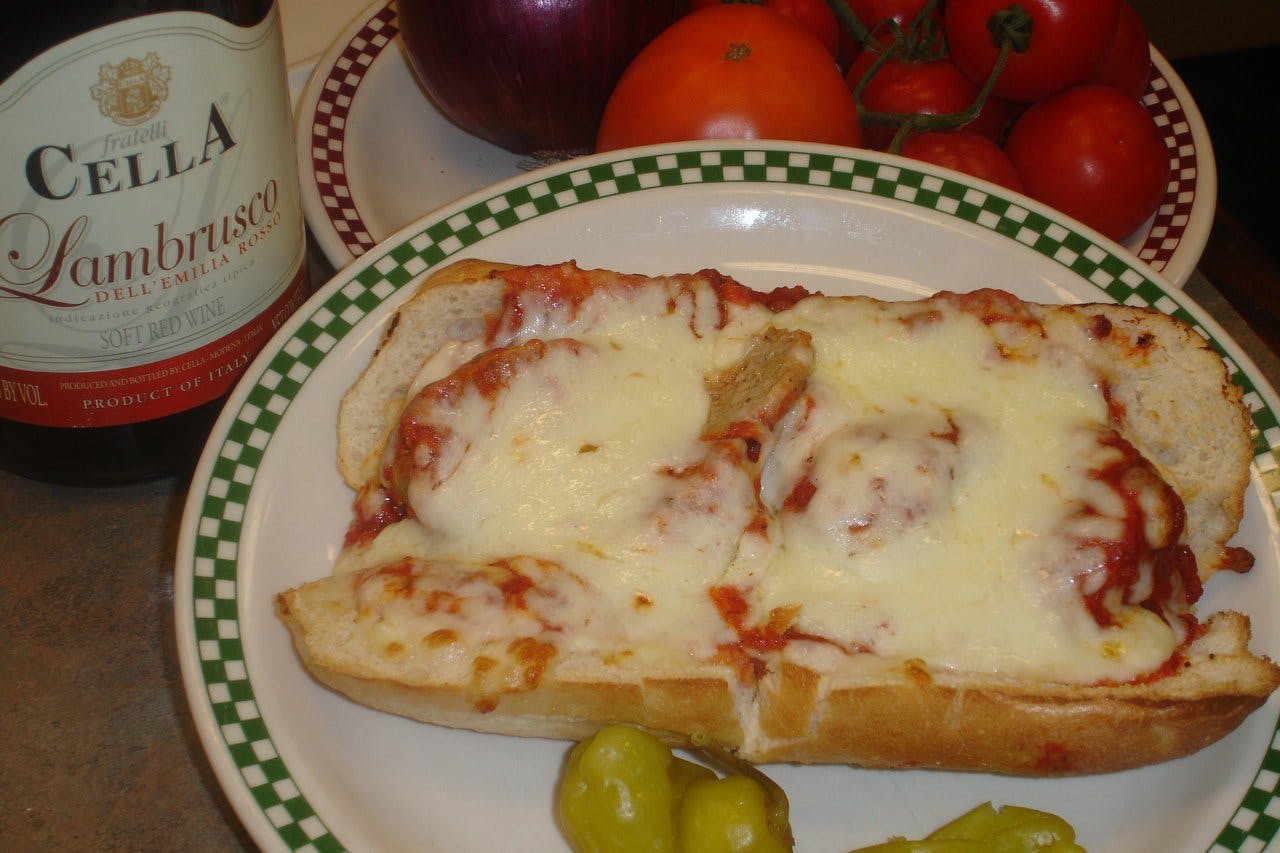 Order Meatball Poorboy Sandwich with Cheese - Sandwich food online from Pino's Pizza store, Rockford on bringmethat.com