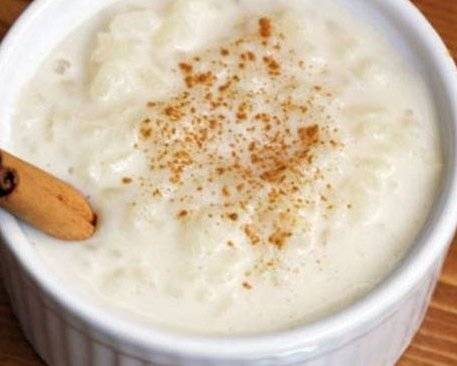 Order Rice Pudding delicious vanilla bean with a touch of cinnamon! food online from 800 Rose Big Florist Gifts & Desserts store, Newport Beach on bringmethat.com