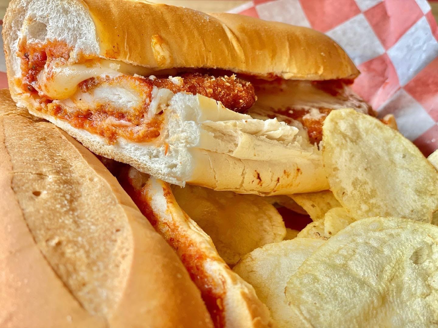 Order Chicken Parm Sub - Small food online from Kelley Square Pizza store, Worcester on bringmethat.com