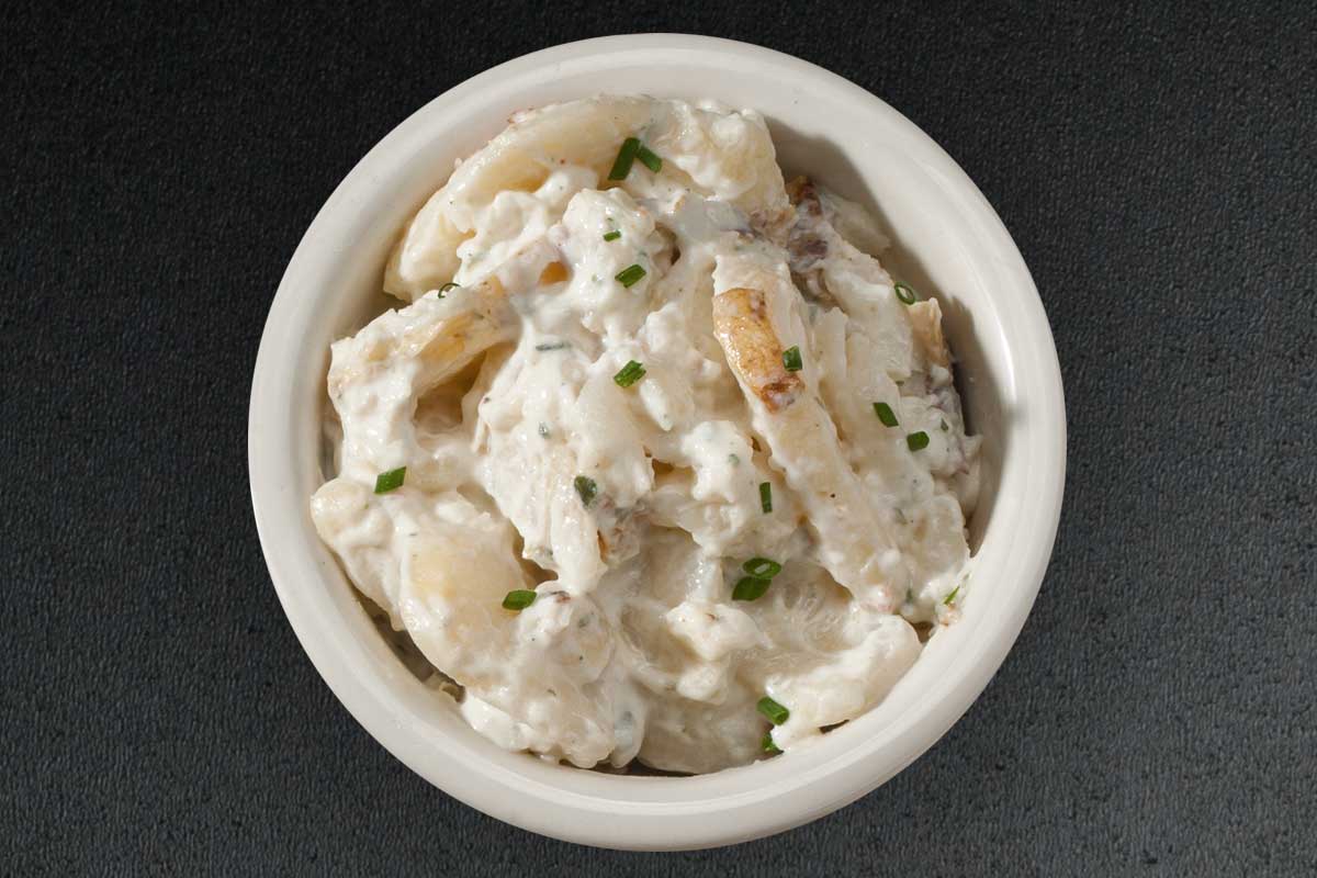 Order Baked Potato Salad food online from Billy Sims Bbq store, Oklahoma City on bringmethat.com