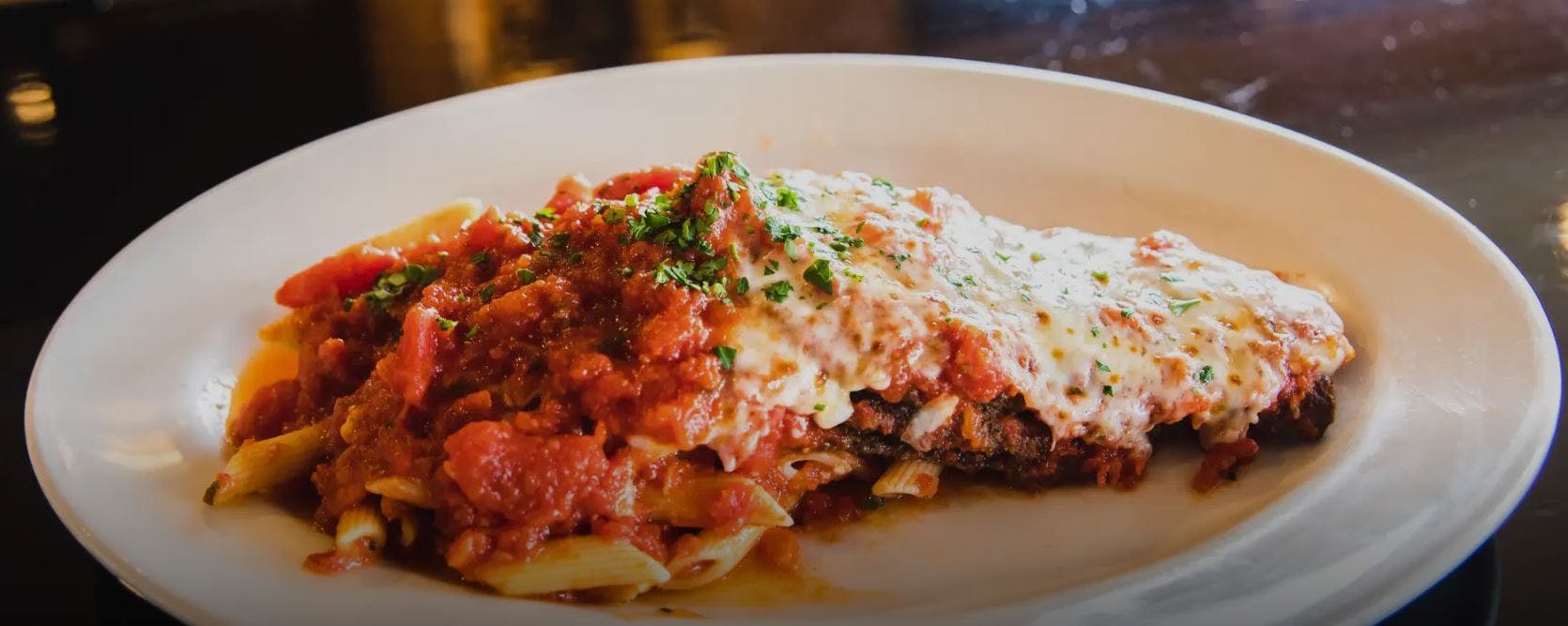 Order Eggplant Parmigiana - Entree food online from Lunetta pizza store, New York on bringmethat.com