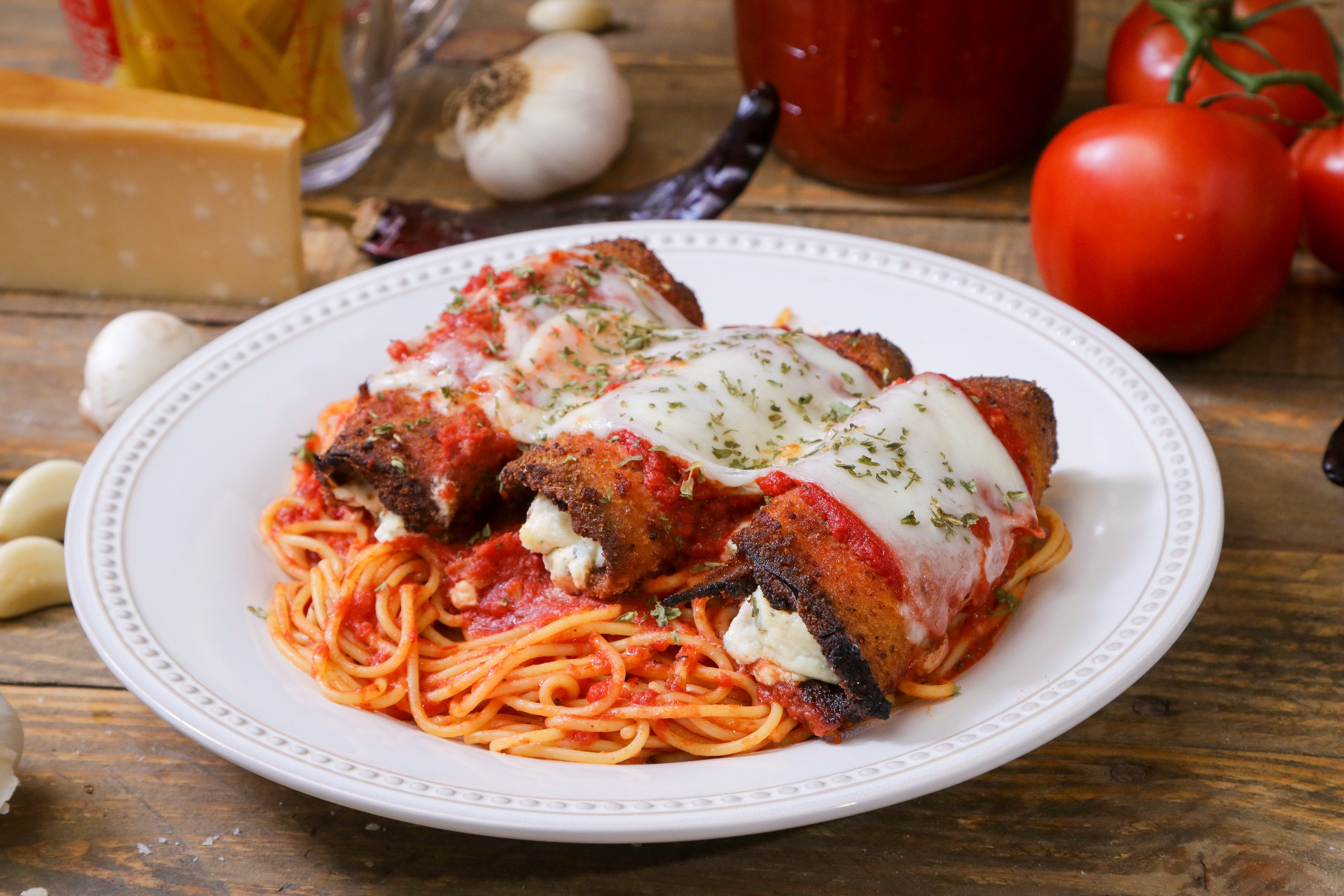 Order Eggplant Parmigiana Pasta - Pasta food online from Ameci Pizza & Pasta store, Canyon Country on bringmethat.com
