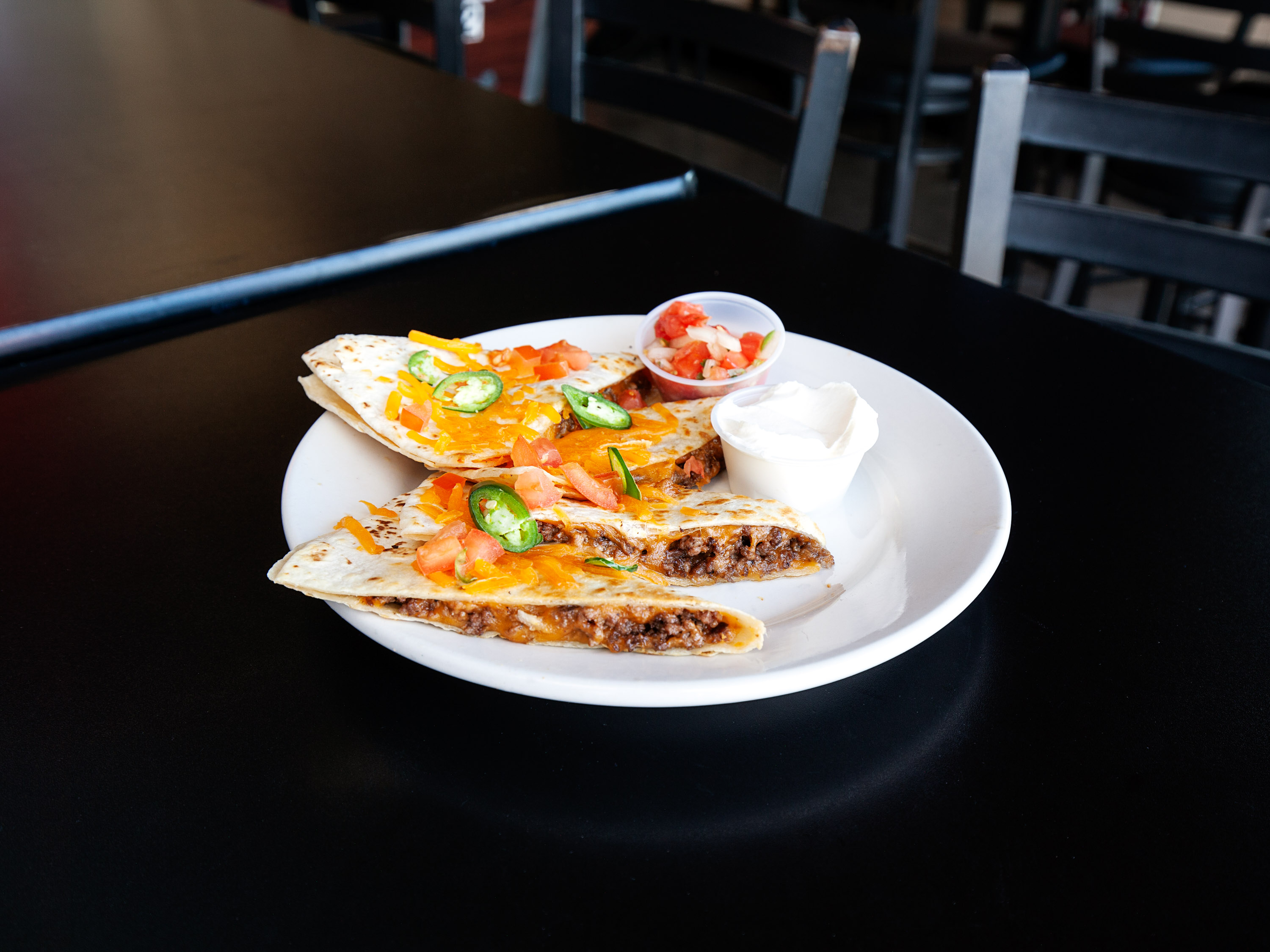 Order Quesadilla food online from Garage Bar & Grille store, Vancouver on bringmethat.com