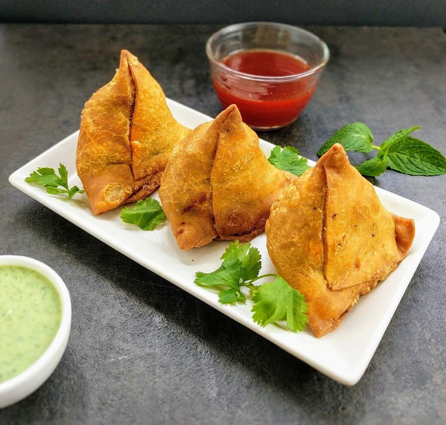 Order Indian Veggie Samosa - 2 Pieces food online from Best Pizza store, Atlanta on bringmethat.com