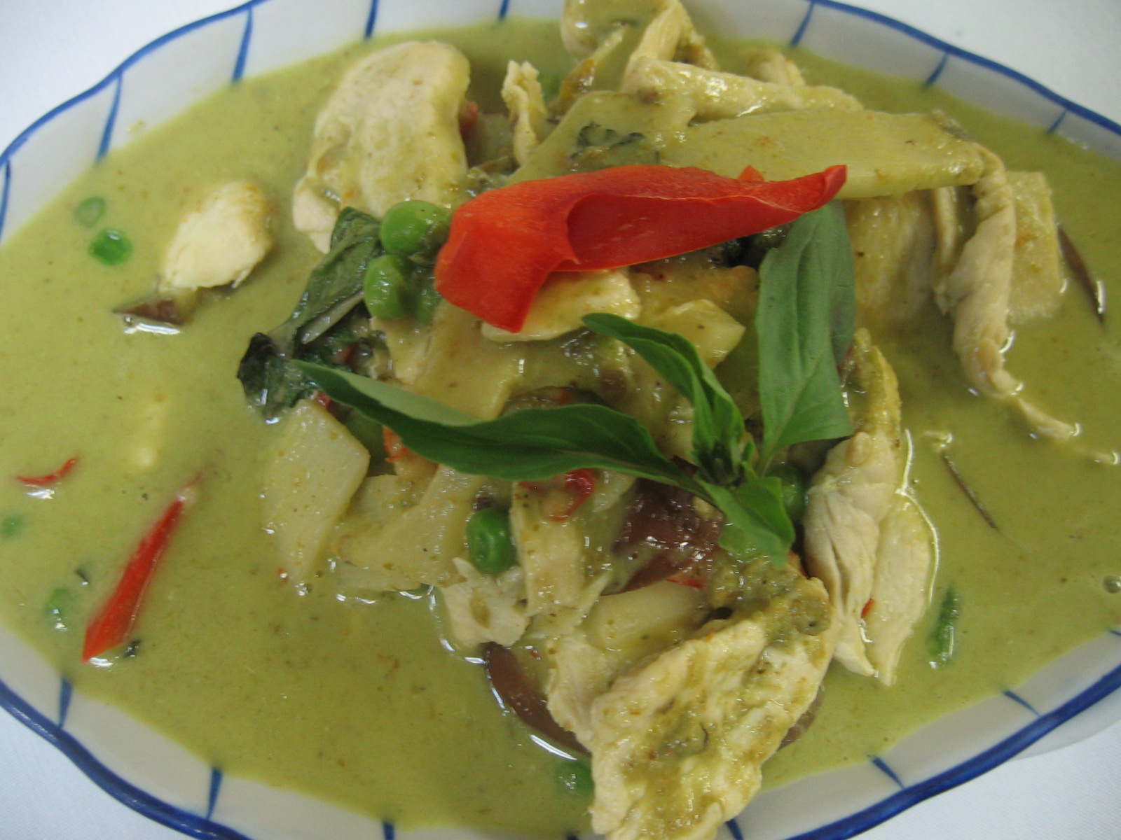 Order Green Curry* food online from Thai Orchid store, ADDISON on bringmethat.com