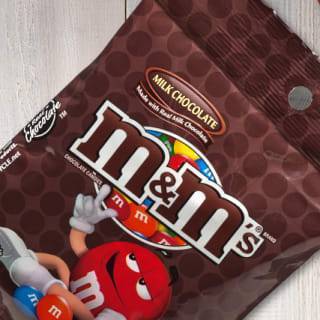 Order M&M Plain food online from AMC Theatres Lake In The Hills 12 store, Lake In The Hills on bringmethat.com