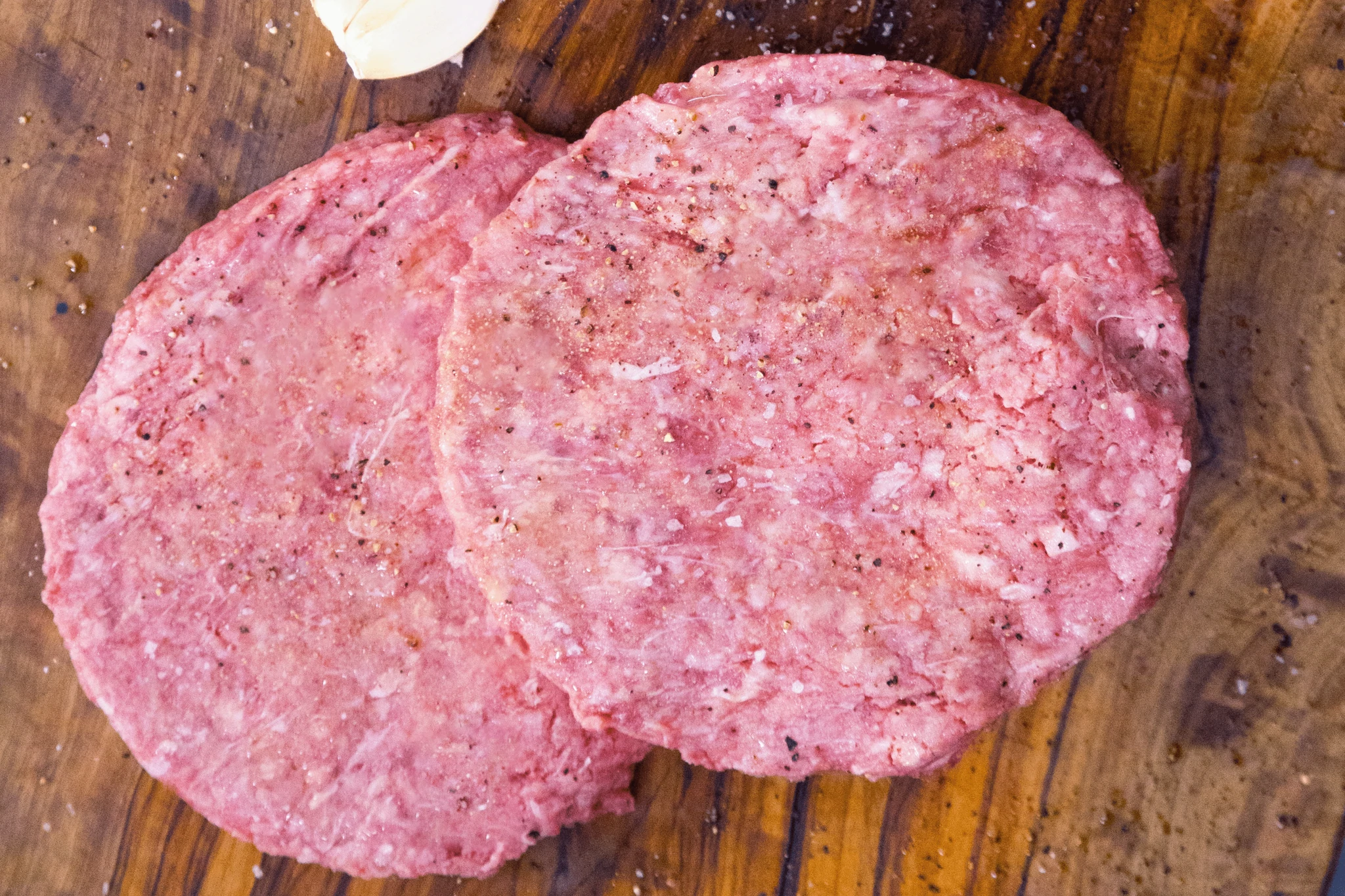 Order Grain Fed 1/2 lb. Ground Beef Patties - 2 Per 1 lb. Package food online from Agridime Meats store, Gilbert on bringmethat.com