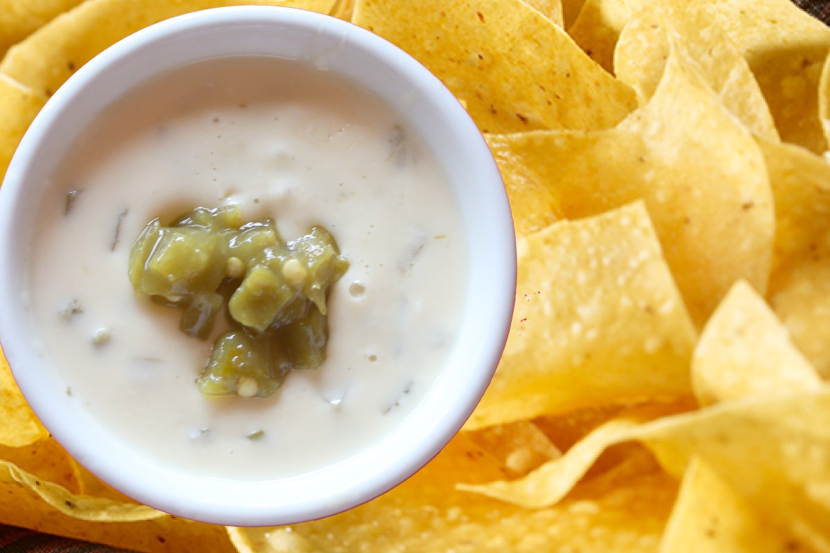 Order Chips & Hatch Chile Queso food online from Savage Burrito store, Woodbridge on bringmethat.com