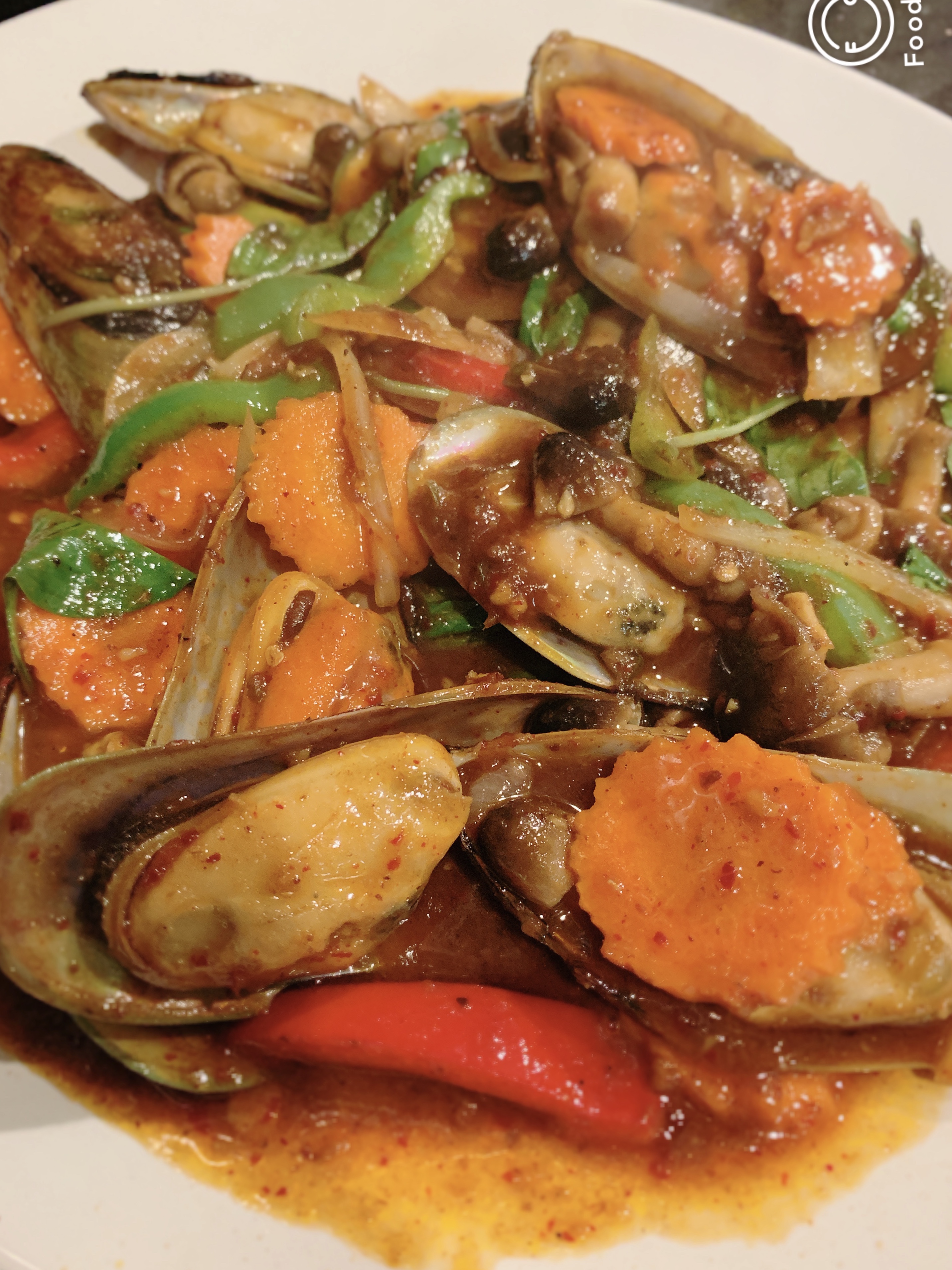 Order Spicy Mussel food online from Exotic Thai Cafe store, Woodland Hills on bringmethat.com