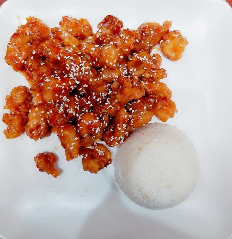 Order 39. Sesame Chicken food online from Dragon Chinese Cuisine  store, Houston on bringmethat.com