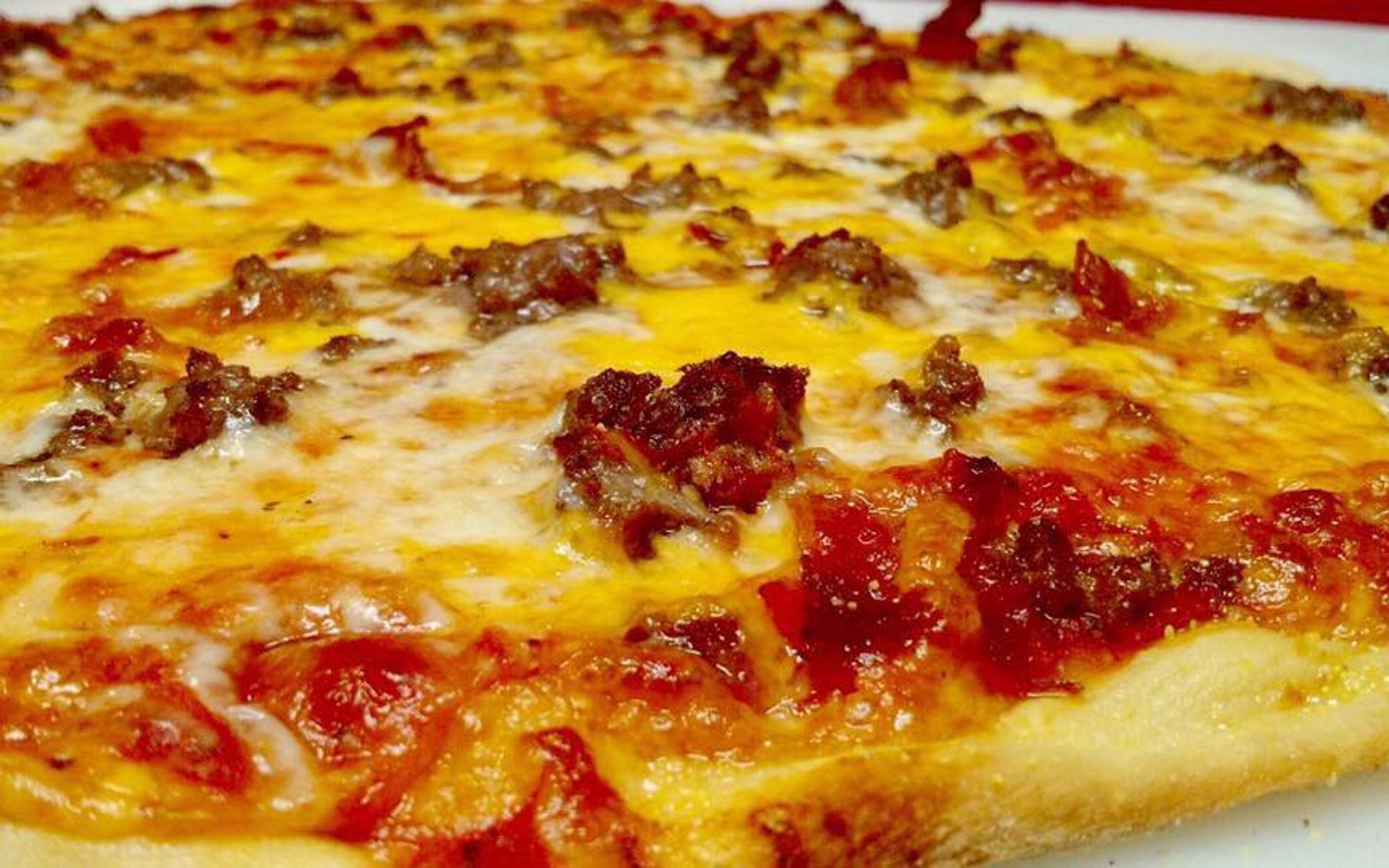 Order Bacon Cheeseburger Thin Crust Pizza - Small food online from Falbo Bros. Pizza store, Iowa City on bringmethat.com