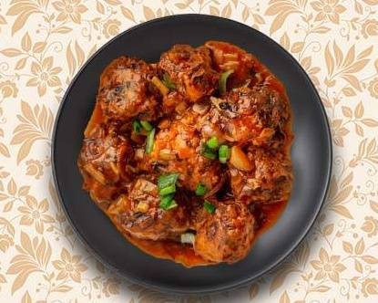 Order Veggie Manchurian food online from Greens and Grains store, Chantilly on bringmethat.com