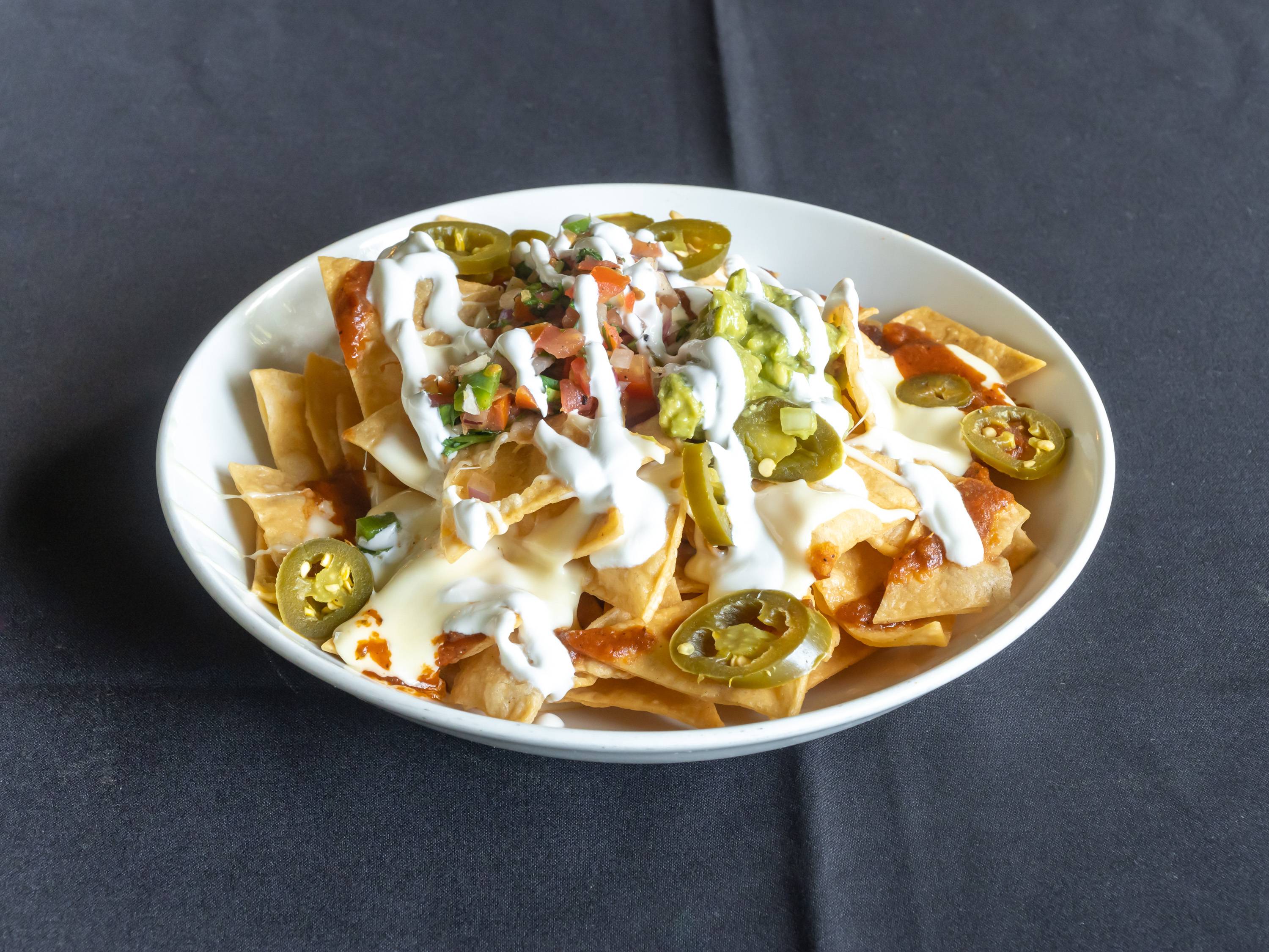Order Nachos Shareable food online from Red Restaurant & Bar store, City of Industry on bringmethat.com