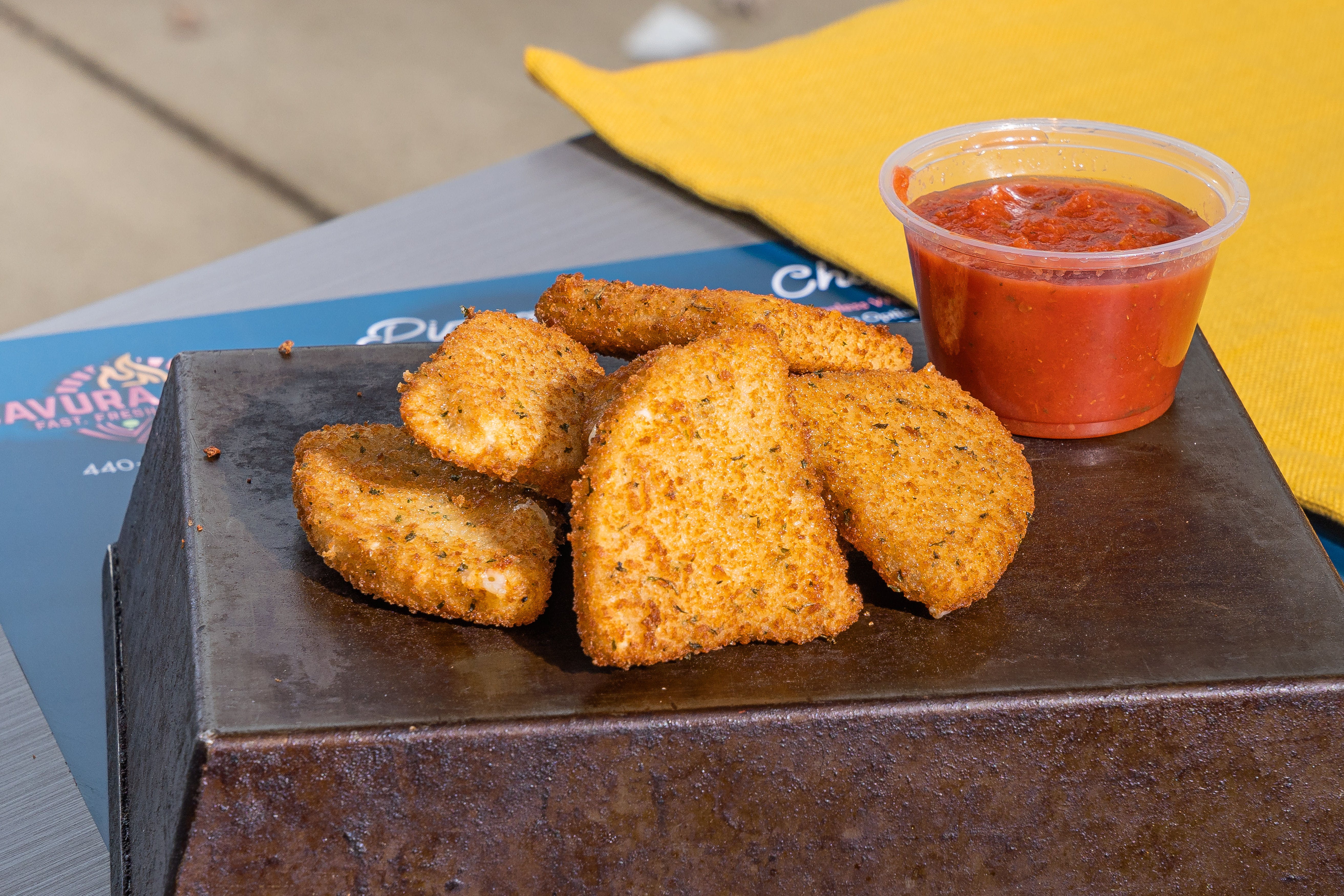 Order Fried Mozzarella Wedges - 6 Pieces food online from Cavura Pizza store, North Olmsted on bringmethat.com