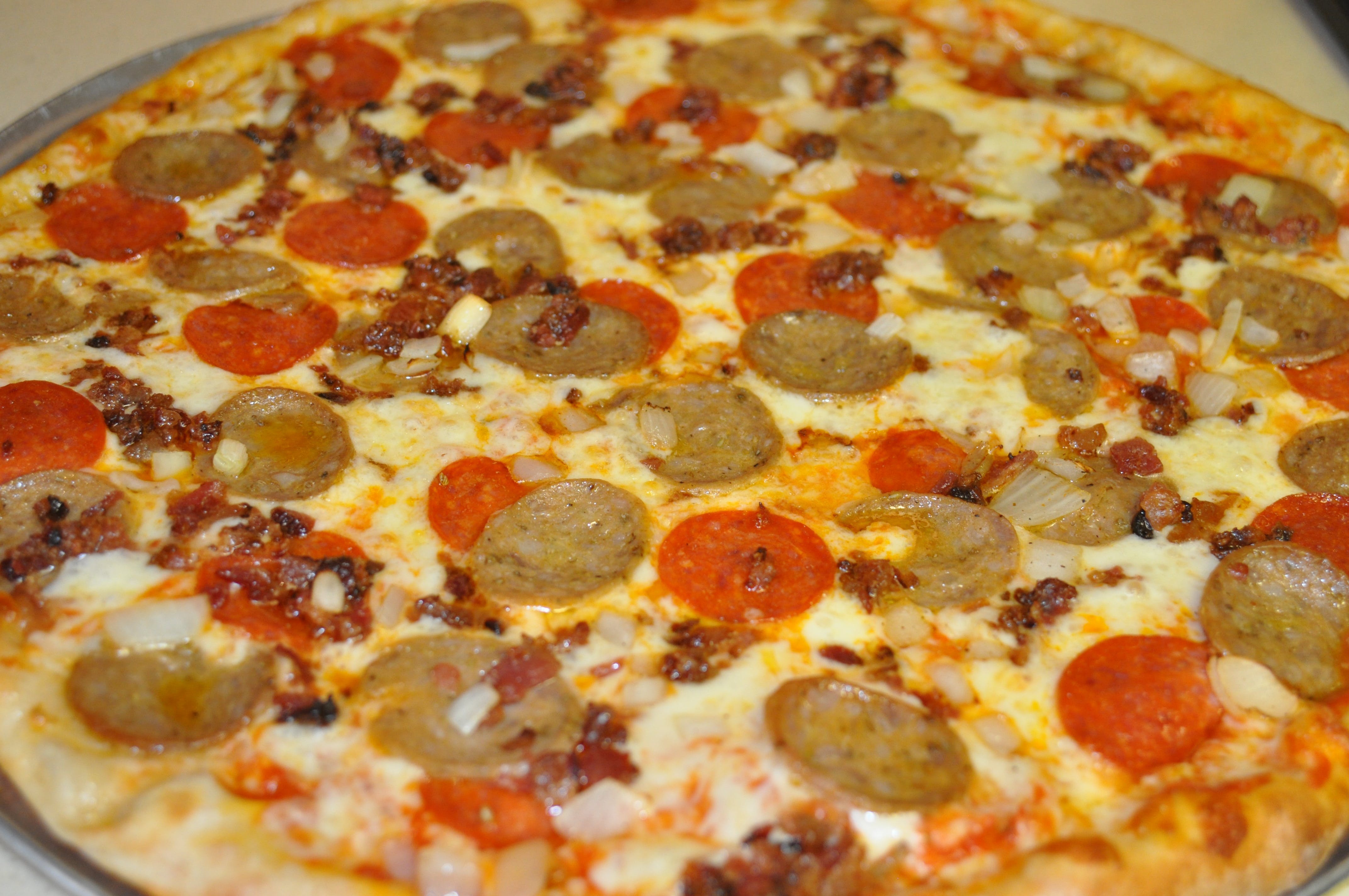 Order Meat Lovers Pizza - Personal food online from Giacomo's Pizza store, Poughkeepsie on bringmethat.com