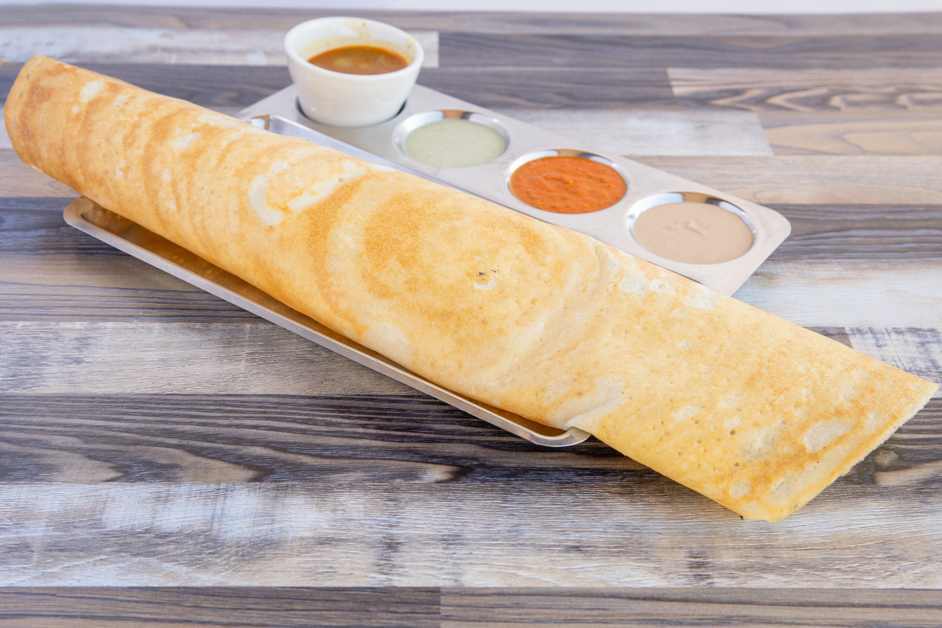 Order Plain Dosa food online from Madras Cafe store, San Diego on bringmethat.com