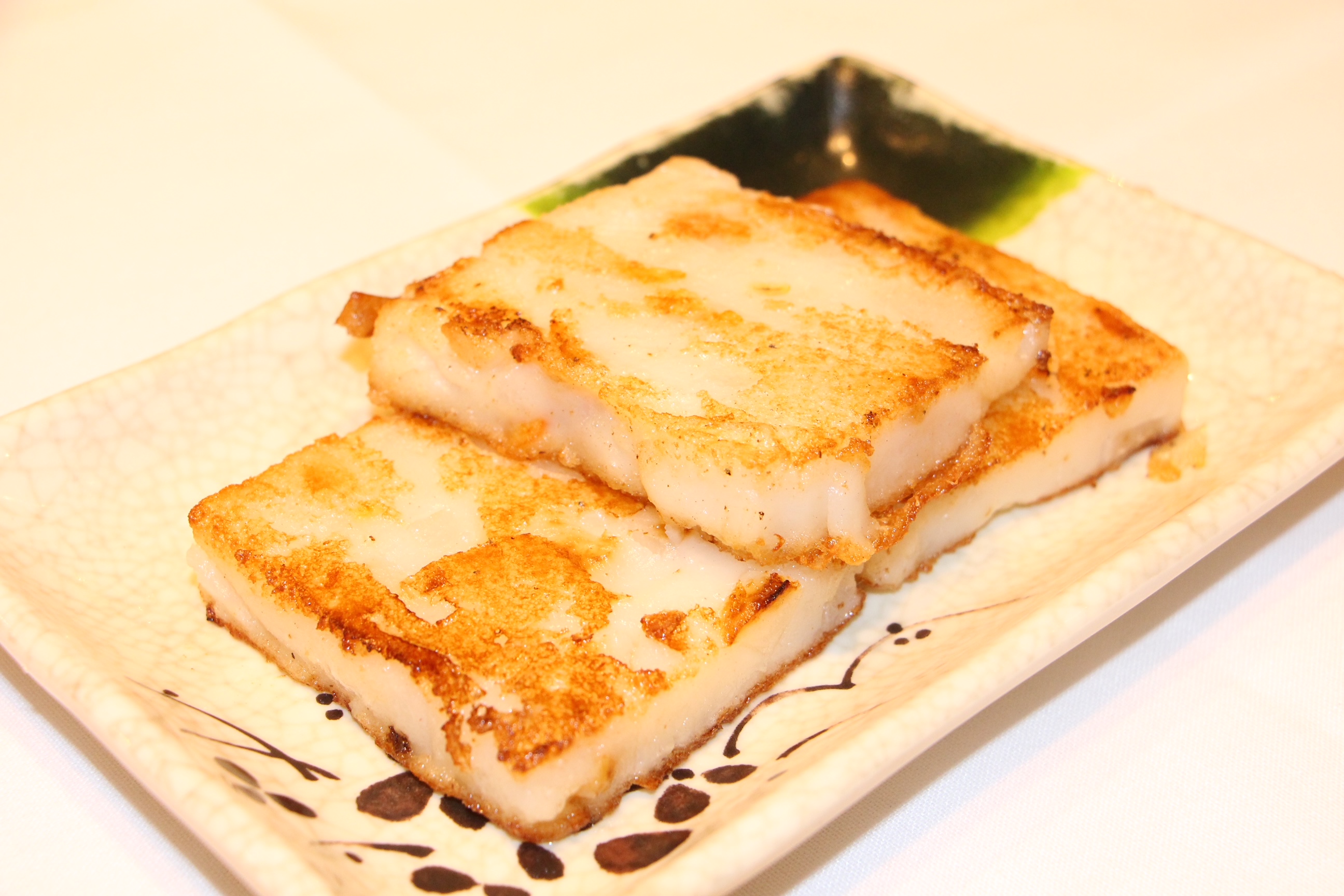 Order Ds22. Pan-Fried Turnip Cake  food online from Nani Restaurant store, Madison on bringmethat.com