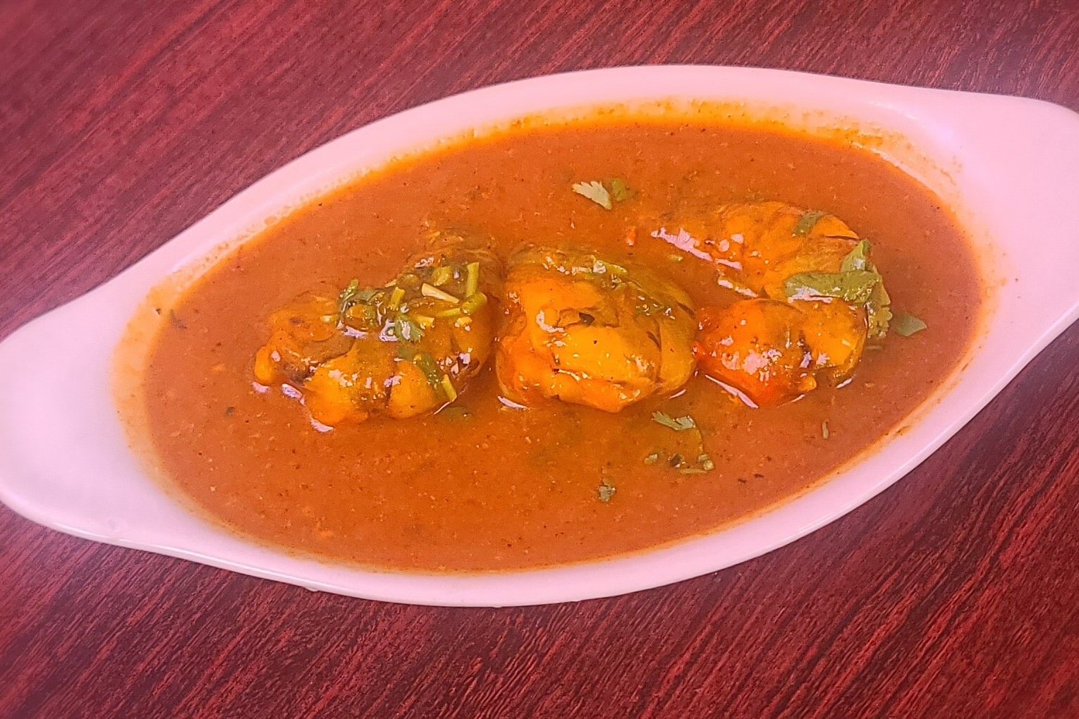 Order Shrimp Curry food online from Om Indian Cuisine store, San Francisco on bringmethat.com