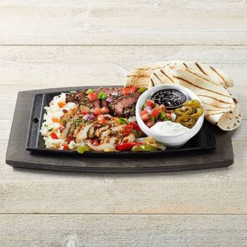 Order Whiskey-Glaze Chicken and Sirloin Fajitas food online from TGI Fridays store, Winchester on bringmethat.com