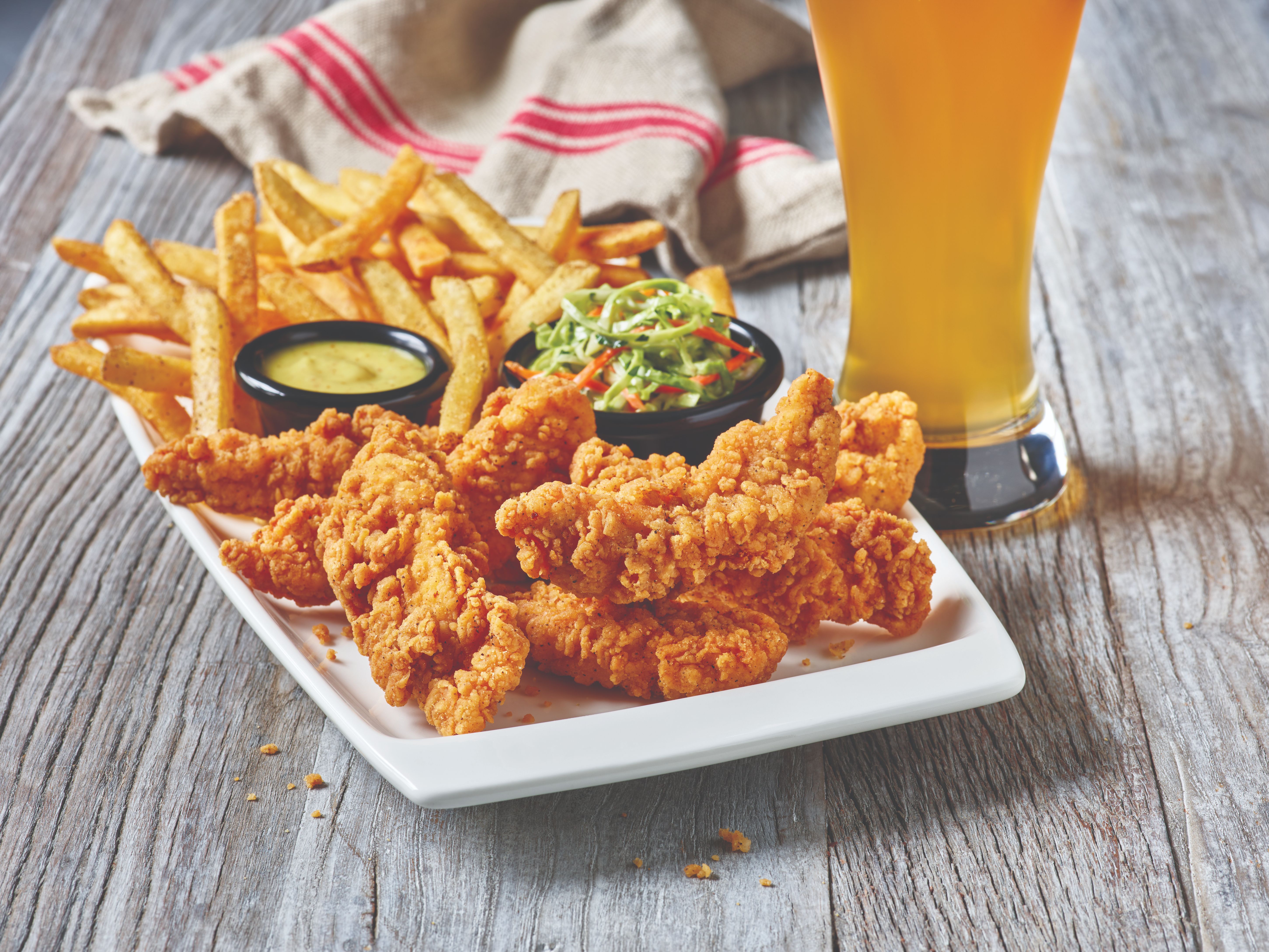 Order Chicken Tenders Platter with Fries and Coleslaw food online from Applebee store, Quakertown on bringmethat.com