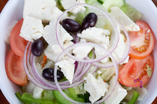 Order Greek Salad food online from El Greco Pizza & Pasta store, Elmhurst on bringmethat.com