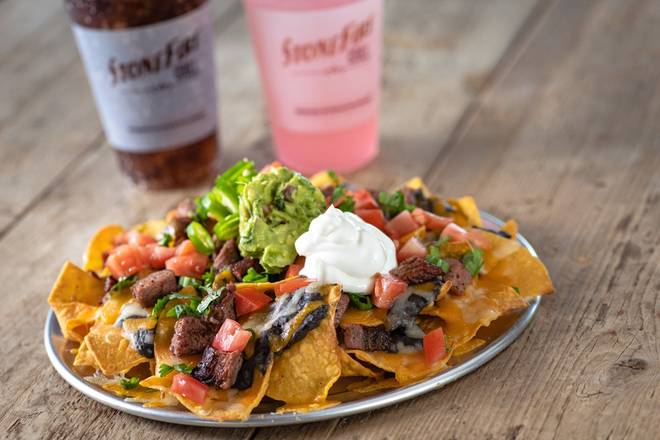 Order Nachos food online from Stonefire Grill store, Valencia on bringmethat.com