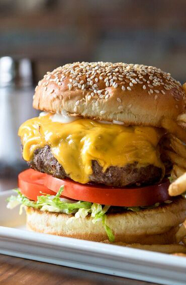 Order 9 oz. Dry Aged Cheeseburger food online from Hyde Park Prime Steakhouse store, Dublin on bringmethat.com