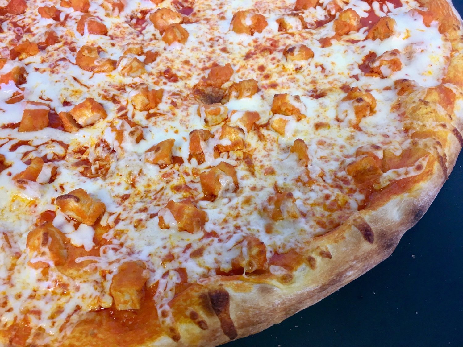 Order Buffalo Chicken Wing Pizza food online from Yaghi Pizzeria store, San Antonio on bringmethat.com
