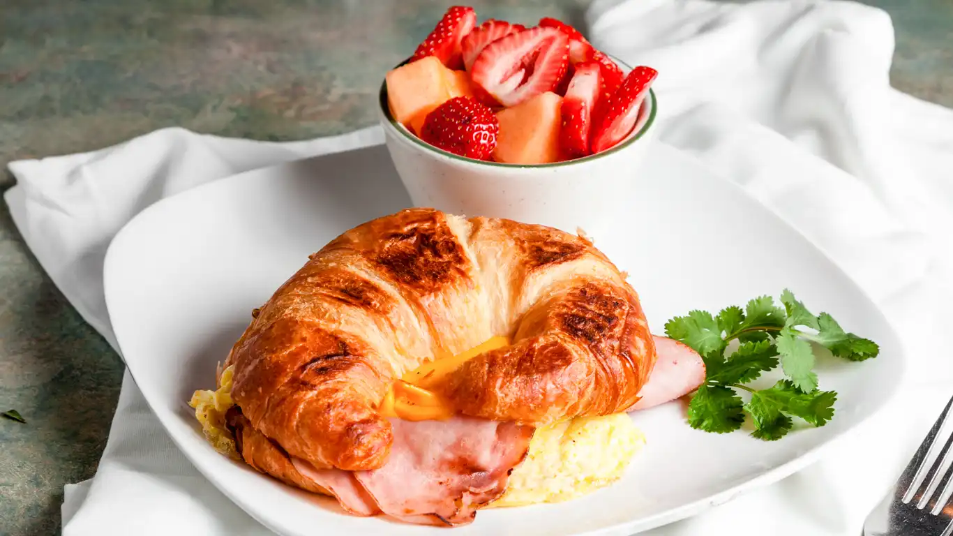 Order Croissant Breakfast Sandwich food online from Country Waffles store, Citrus Heights on bringmethat.com