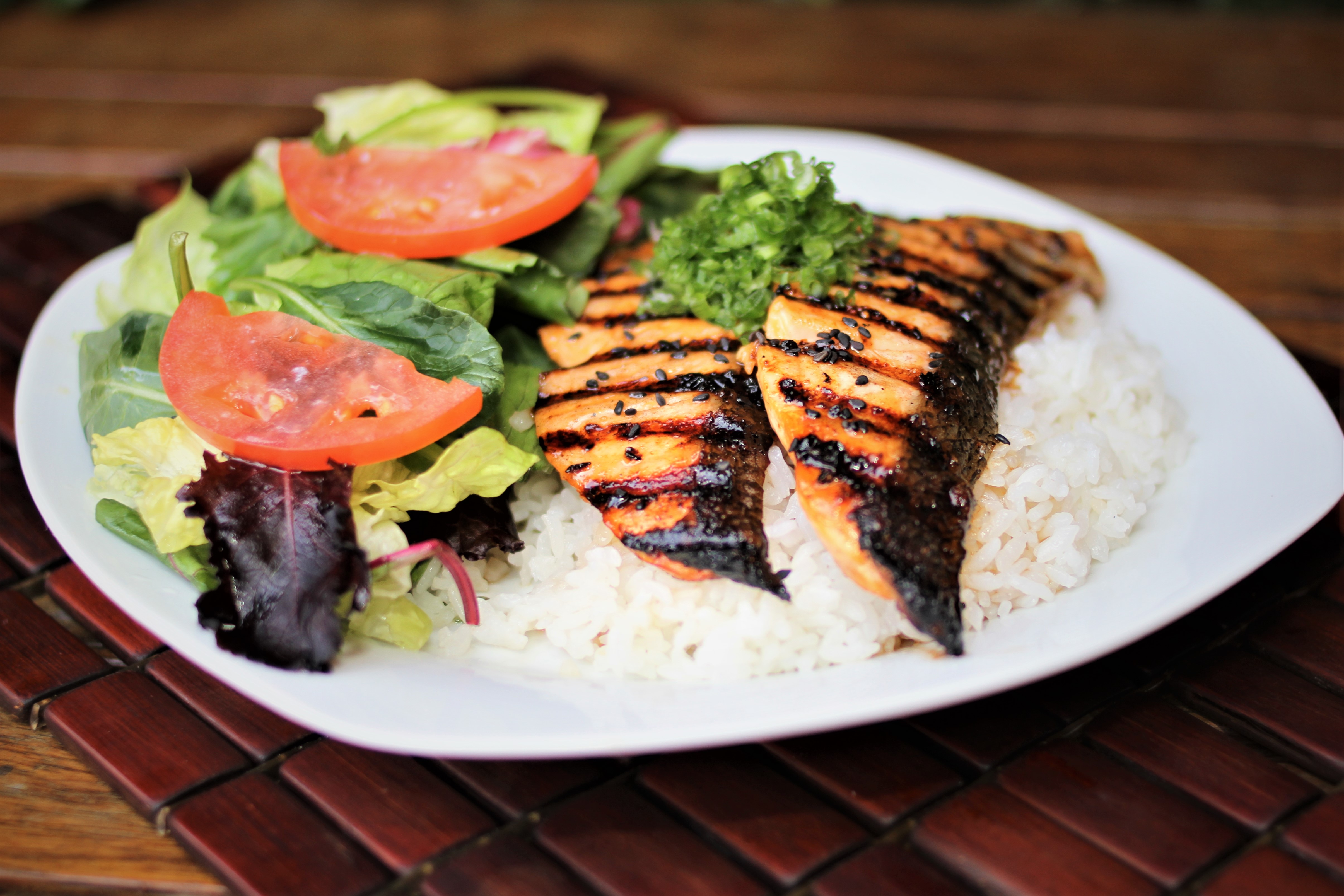 Order Signature Chargrilled Salmon food online from Nalu Island Grill store, San Clemente on bringmethat.com