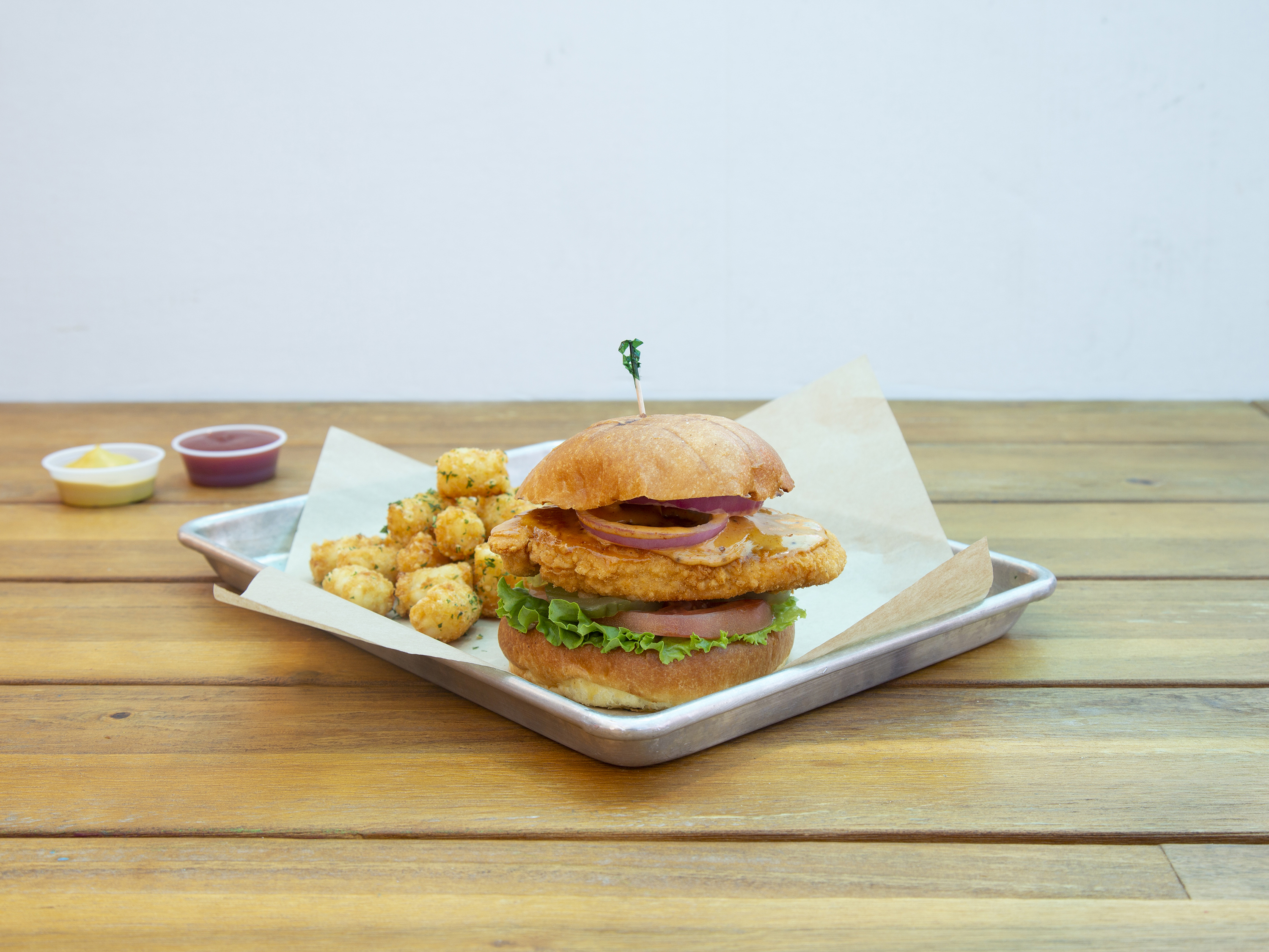 Order The Cluckfied Chicken Burger food online from Butcher N Cheese store, San Diego on bringmethat.com