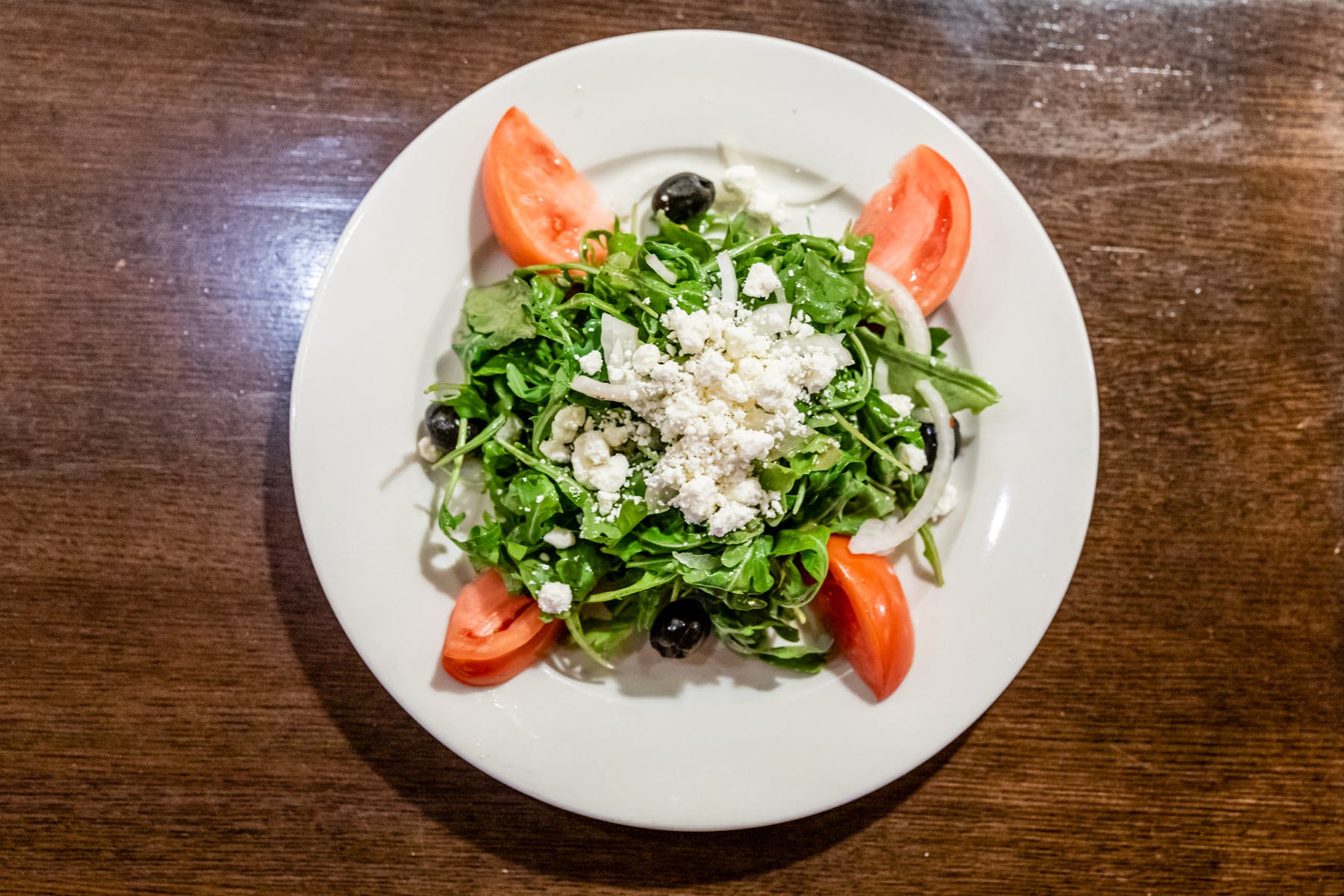 Order Arugula & Goat Cheese Salad - Salad food online from Mario's Restaurant store, Clifton on bringmethat.com