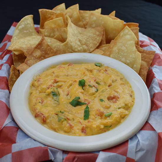 Order Chips & Queso food online from Tia's Taco Hut store, San Antonio on bringmethat.com