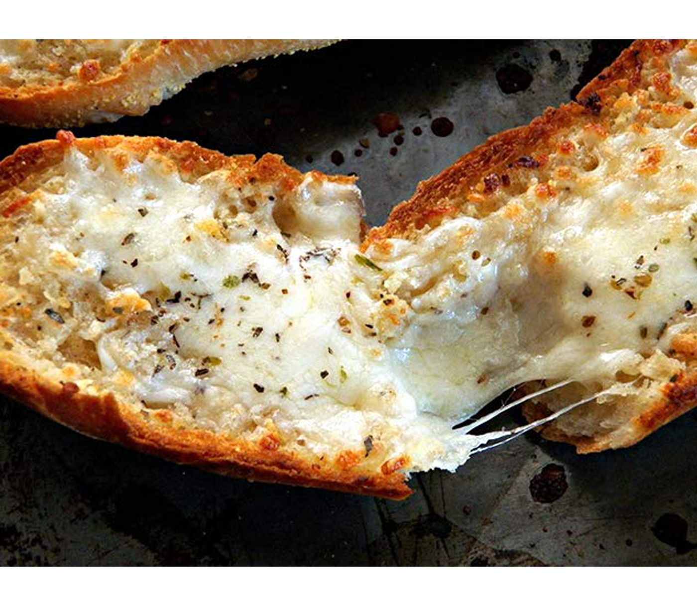Order Garlic Bread with Cheese food online from Napoli's Pizza store, Virginia Beach on bringmethat.com