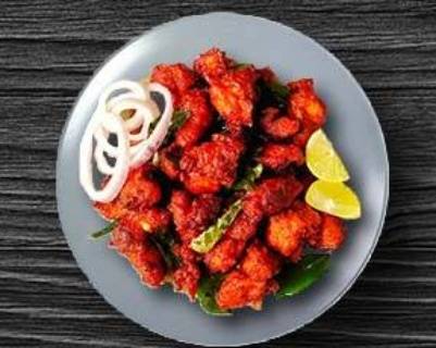 Order Andhra Chicken 65 food online from Tick-Tock Tikka House store, Cumberland on bringmethat.com