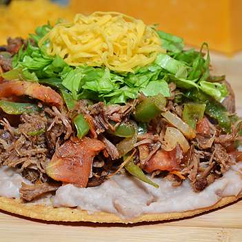 Order Beef Tostada food online from Federico Mexican Food store, Scottsdale on bringmethat.com
