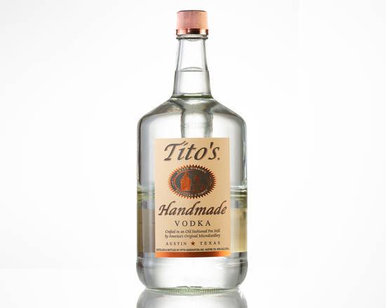 Order Tito's, 1.75L vodka (40.0% ABV) food online from One Stop Liquor store, Los Angeles on bringmethat.com