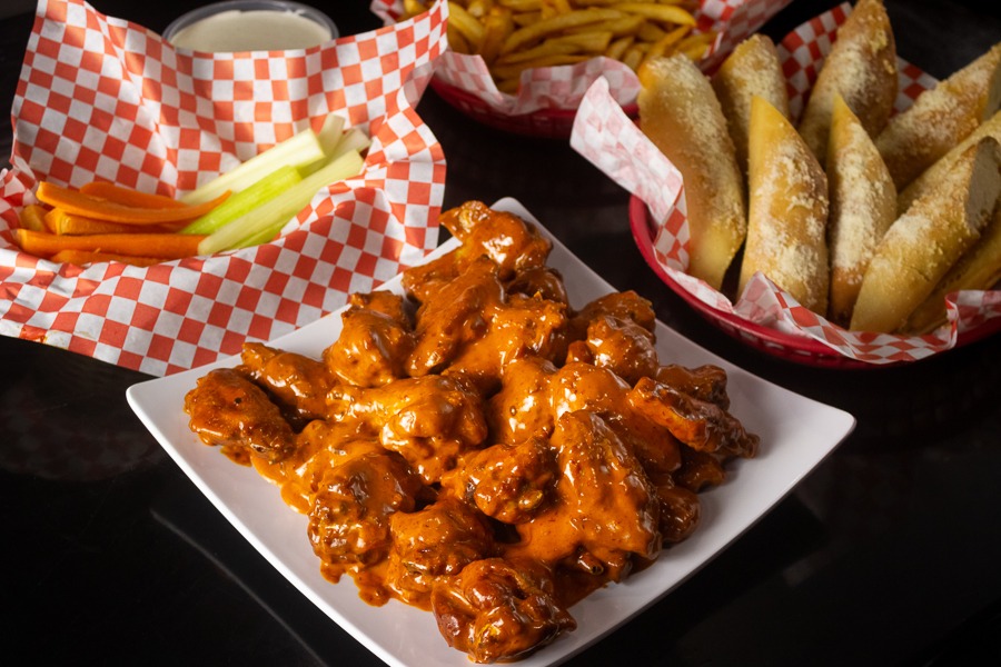 Order 25 Wings Family Combo food online from California Fries And Wings store, San Diego on bringmethat.com