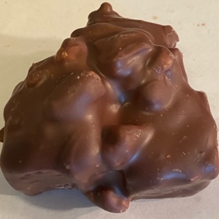 Order 1 Lb. Rocky Road Cluster food online from Rocky Mountain Chocolate Factory store, Winston-Salem on bringmethat.com