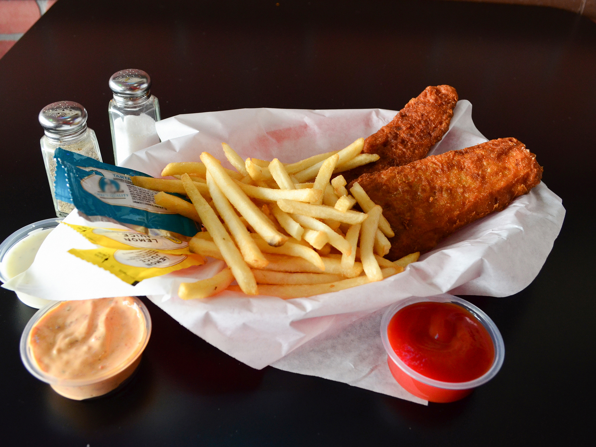Order Fish and Chips Basket food online from Cheesesteak Restaurant store, Elk Grove on bringmethat.com
