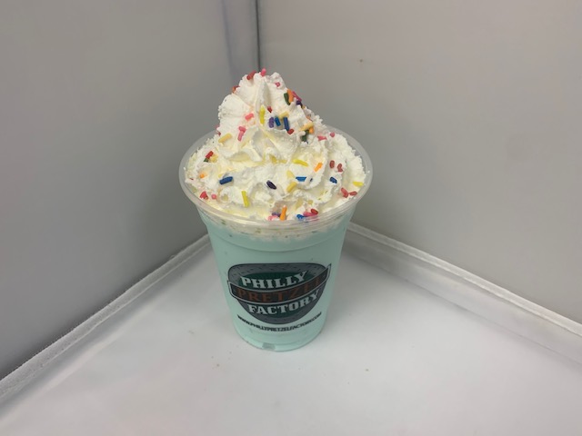 Order Birthday Cake Milkshake, served in a foam cup for freshness food online from Philly Pretzel Factory store, Mt Ephraim on bringmethat.com